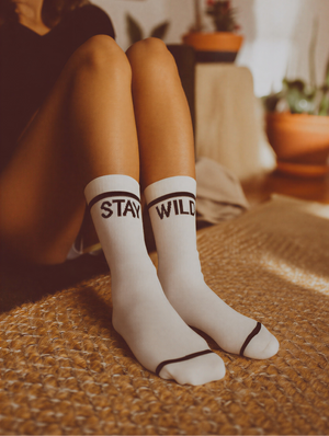"Stay Wild" Crew Socks – Ivory & Black by Atticus Poetry