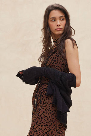 Pointelle Knit Trumpet-Sleeve Peplum Cardigan
