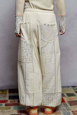 Solid pattern patch detail rib knit jogger pants