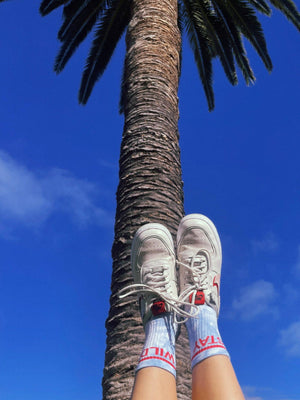 “Stay Wild” Crew Socks – Blue Tie Dye by Atticus Poetry