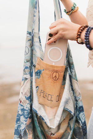 Peace Out Turquoise Linen Tote Bag with Doves and Sunrise
